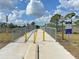 Walk/bike path with bridge access at 325 San Benito Ave, North Port, FL 34287