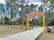 Entrance to the Boundless Adventures playground with shaded areas at 325 San Benito Ave, North Port, FL 34287