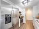 Modern kitchen with stainless steel appliances and ample cabinet space at 325 San Benito Ave, North Port, FL 34287