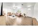 Open living room with hardwood floors and recessed lighting at 325 San Benito Ave, North Port, FL 34287
