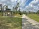 Park trail with gazebo and benches at 325 San Benito Ave, North Port, FL 34287