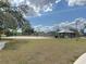 Sand volleyball court near picnic area and shaded seating at 325 San Benito Ave, North Port, FL 34287