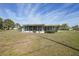 House with screened patio and large backyard at 334 Skylark Nw Ln, Port Charlotte, FL 33952