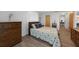 Bedroom with wood dresser, and coastal bedding at 334 Skylark Nw Ln, Port Charlotte, FL 33952