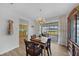 Bright dining room with access to the back patio at 334 Skylark Nw Ln, Port Charlotte, FL 33952