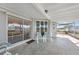 Screened patio with view of the dining room at 334 Skylark Nw Ln, Port Charlotte, FL 33952