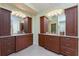 Elegant bathroom with double vanities, granite countertops, and plenty of storage space at 3507 Marsala Ct, Punta Gorda, FL 33950