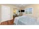 Cozy bedroom with white door and large closet with mirrored doors, offering ample storage at 3507 Marsala Ct, Punta Gorda, FL 33950