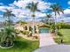 Charming single-Gathering home with a well-maintained lawn, lush landscaping, and a two-car garage at 3507 Marsala Ct, Punta Gorda, FL 33950