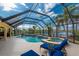 Relaxing screened-in pool and spa area overlooking the waterfront, perfect for entertaining and leisure at 3507 Marsala Ct, Punta Gorda, FL 33950