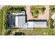Aerial view showcasing home's layout and landscaping at 351 S Mccall Rd, Englewood, FL 34223