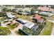 Aerial view of a house with a pool in a residential neighborhood at 351 S Mccall Rd, Englewood, FL 34223