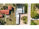 Aerial view of house with pool and driveway at 351 S Mccall Rd, Englewood, FL 34223