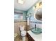 Clean bathroom featuring a vessel sink and walk-in shower at 351 S Mccall Rd, Englewood, FL 34223