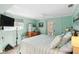 Primary bedroom with access to the patio and pool at 351 S Mccall Rd, Englewood, FL 34223