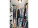 Large walk-in closet with double hanging rods and shelving at 351 S Mccall Rd, Englewood, FL 34223