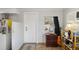 Small entryway with a door to the outside, globe, and books at 351 S Mccall Rd, Englewood, FL 34223
