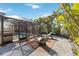 Pool and patio area with lounge chairs and screened enclosure at 351 S Mccall Rd, Englewood, FL 34223