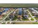 An aerial view of a beautiful home situated on a canal in a residential area at 3800 Carupano Ct, Punta Gorda, FL 33950