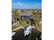 Aerial view of canal-front home with pool and boat lift at 3800 Carupano Ct, Punta Gorda, FL 33950