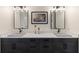 Modern bathroom with double vanity, quartz countertop, and gray sinks at 3800 Carupano Ct, Punta Gorda, FL 33950