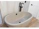 Relaxing bathroom with a free-standing concrete tub at 3800 Carupano Ct, Punta Gorda, FL 33950