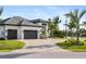 Modern home with a two-car garage and nicely landscaped yard at 3800 Carupano Ct, Punta Gorda, FL 33950