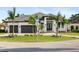 Modern home with a two-car garage and nicely landscaped yard at 3800 Carupano Ct, Punta Gorda, FL 33950