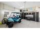 Garage with golf cart, overhead storage, and workbench at 3800 Carupano Ct, Punta Gorda, FL 33950