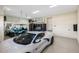 Oversized garage with storage, golf cart and sports car at 3800 Carupano Ct, Punta Gorda, FL 33950