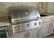 Stainless steel grill with multiple burners and hood at 3800 Carupano Ct, Punta Gorda, FL 33950
