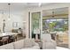 Living room with sliding doors to the lanai and pool area at 3800 Carupano Ct, Punta Gorda, FL 33950