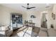Sunlit office features built-in shelving and seating area at 3800 Carupano Ct, Punta Gorda, FL 33950