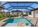 Relaxing pool and spa with a covered lanai creating a private outdoor oasis at 3800 Carupano Ct, Punta Gorda, FL 33950