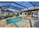 Expansive pool and spa with covered lanai and views; perfect for outdoor living at 3800 Carupano Ct, Punta Gorda, FL 33950