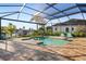 Inviting pool area with covered lanai, offering ample space for relaxation and entertainment at 3800 Carupano Ct, Punta Gorda, FL 33950