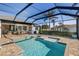 Luxury pool and spa with covered lanai and access to indoor living spaces at 3800 Carupano Ct, Punta Gorda, FL 33950
