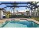 Stunning pool and spa, screened-in lanai with tranquil water views at 3800 Carupano Ct, Punta Gorda, FL 33950