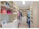 Large walk-in closet with ample shelving and drawers at 3800 Carupano Ct, Punta Gorda, FL 33950
