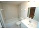 Clean bathroom with tub, toilet and vanity at 3919 San Rocco Dr # 31A, Punta Gorda, FL 33950