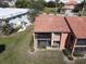 Condo building exterior with screened-in balcony at 3919 San Rocco Dr # 31A, Punta Gorda, FL 33950
