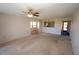 Large living room with view and access to balcony at 3919 San Rocco Dr # 31A, Punta Gorda, FL 33950