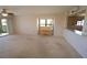 Living room with piano and view to golf course at 3919 San Rocco Dr # 31A, Punta Gorda, FL 33950