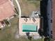Community pool with patio furniture for relaxation at 3919 San Rocco Dr # 31A, Punta Gorda, FL 33950