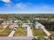 Aerial view of single-Gathering home with pool at 3954 S Chamberlain Blvd, North Port, FL 34286