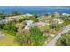 The aerial view highlights this waterfront home and neighborhood, just a short distance from the open bay at 425 Fireball Ct, Punta Gorda, FL 33950