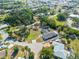 Aerial view of a charming residential area with well-maintained homes, lush landscaping, and friendly community atmosphere at 425 Fireball Ct, Punta Gorda, FL 33950