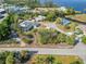 This aerial view showcases a waterfront community with easy access to the marina, docks, and plenty of activities at 425 Fireball Ct, Punta Gorda, FL 33950