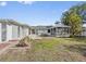 Relax in the backyard with gazebo and lush landscaping at 425 Fireball Ct, Punta Gorda, FL 33950