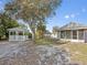 This backyard features a gazebo, mature trees and ample open space at 425 Fireball Ct, Punta Gorda, FL 33950